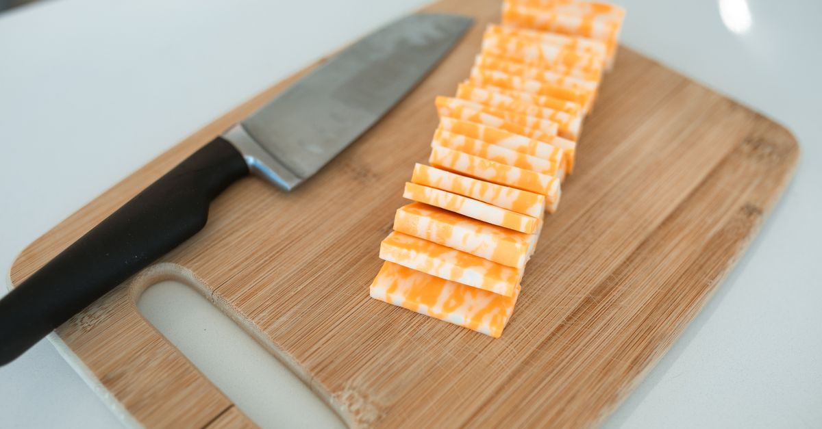Squash cut into pieces on a kitchen board