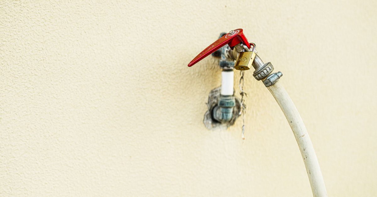 Hose adapter connected to an outdoor faucet